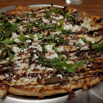 Moda Restaurant and Bar - Wild mushroom pizza. Pretty good. Balsamic drizzle slightly sweet. - New American Near Me - Columbus, Ohio