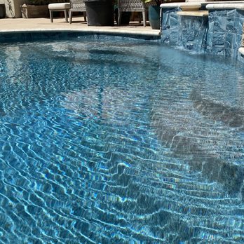 Capstone Pool & Spa Remodeling - Here is a shot of the water feature. Note the tile work. - Pool & Hot Tub Service Near Me Capstone Pool & Spa Remodeling - Here is a shot of the water feature. Note the tile work. - Pool & Hot Tub Service Near Me