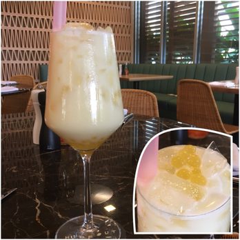 Hideout - "No. 115" - Pau Maui Vodka, Island Fruit Juice, Mango, Boba. Named after this being the 115th Marriott Autograph Hotel. - Bars Near Me - Honolulu, Hawaii