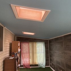 Crum's Family Painting - After Crum painted it and helped with curtains