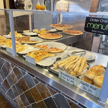 Sal's Famous Pizzeria - Fresh pizza and rolls ready to hand out - Pizza Near Me - Brownsburg, Indiana Sal's Famous Pizzeria - Fresh pizza and rolls ready to hand out - Pizza Near Me - Brownsburg, Indiana