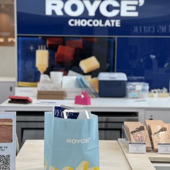 Royce' Chocolate - Santa Clara - Kiosk Front - Chocolatiers & Shops Near Me - Santa Clara, California Royce' Chocolate - Santa Clara - Kiosk Front - Chocolatiers & Shops Near Me - Santa Clara, California