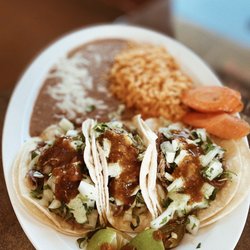 Los Amigos Taqueria - Carnitas Street Tacos with Rice and Beans is always a good choice extremely delicious!