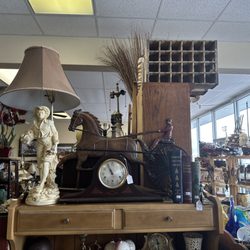 Widefield Square Vintage and Thrift Shop - The coolest antique clock! She even wound it up for me so I could hear it chime.