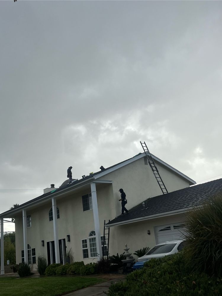 Slide of TopStamp Roofing