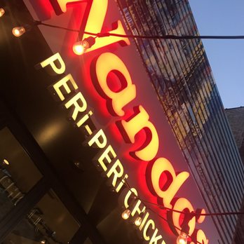 Nando's Peri-Peri - Exterior sign - South African Near Me - Chicago, Illinois Nando's Peri-Peri - Exterior sign - South African Near Me - Chicago, Illinois