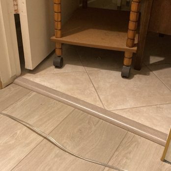 Love Home Floor - molding between LVP and existing tile - Flooring Near Me - Santa Ana, California
