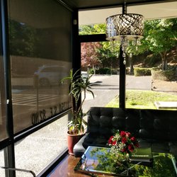 Eden Salon & Spa - Waiting area inside Eden. They have shades do you're not blinded and plenty of natural sunlight to keep their plants happy & the air fresh