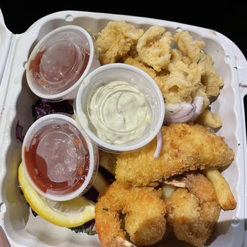 The Fish Hopper - Comination basket w/ chips (fish, shrimp, calamari, fries and coleslaw) - Seafood Near Me - Monterey, California The Fish Hopper - Comination basket w/ chips (fish, shrimp, calamari, fries and coleslaw) - Seafood Near Me - Monterey, California