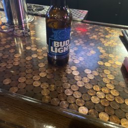 a beer bottle on a counter