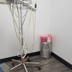 Great Expressions Dental Centers - Rusted stand, rusted and dented trash can with sharps container.