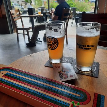 Dolores River Brewery - two glasses of beer and a crochet board - Pizza Near Me - Dolores, Colorado