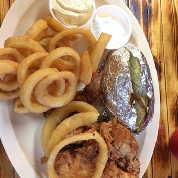 West Union Cafe - a plate of food with onion rings and a pickle - Seafood Near Me - West Union, Illinois