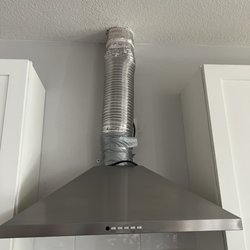 AJ Madison Home & Kitchen Appliances Showroom - Duct left like this for over a month until I finally called. They informed me the install company wont install because it's tile.....NO