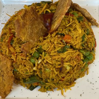 Que Bacano - Arroz con Pollo. Very flavorful! Reminded me eating my mom's Arroz con pollo growing up. - Colombian Near Me - Portland, Oregon