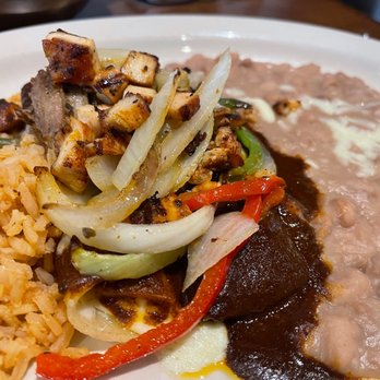 Casa Mama - I don't remember exactly what this is. Seem like it was enchiladas with Mole, chicken and grilled vegetables on top! It was outstanding! - Mexican Near Me - Rockwall, Texas Casa Mama - I don't remember exactly what this is. Seem like it was enchiladas with Mole, chicken and grilled vegetables on top! It was outstanding! - Mexican Near Me - Rockwall, Texas