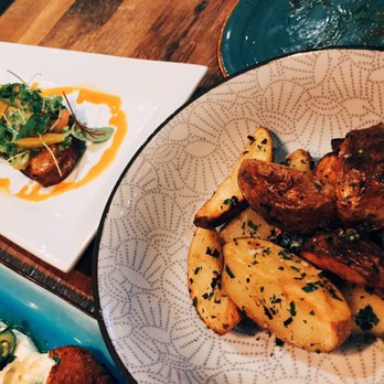 Brighton Bodega - Duck fat roast potatoes and avocado toast with smoked salmon - Cocktail Bars Near Me - Brighton, Massachusetts