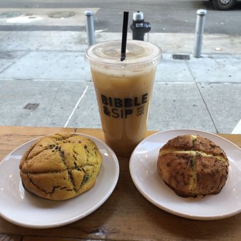 Bibble & Sip - Bolo bao, garlic cream cheese bun, and mango creamsicle latte - Coffee & Tea Near Me - New York, New York Bibble & Sip - Bolo bao, garlic cream cheese bun, and mango creamsicle latte - Coffee & Tea Near Me - New York, New York