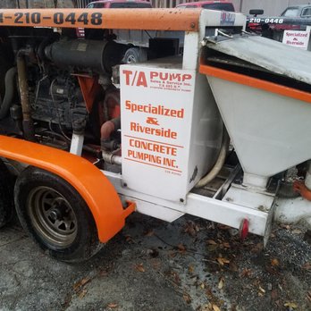 Specialized Concrete Pumping - a truck with a pump attached to it - General Contractors Near Me Specialized Concrete Pumping - a truck with a pump attached to it - General Contractors Near Me