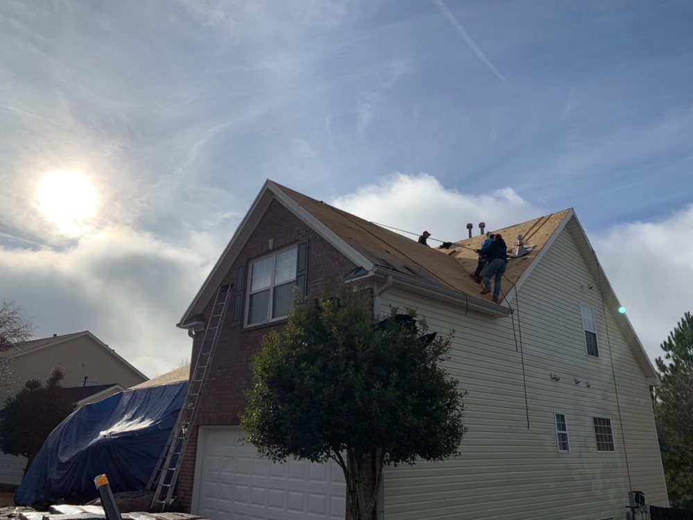 Slide of Spartan Roofing Solutions