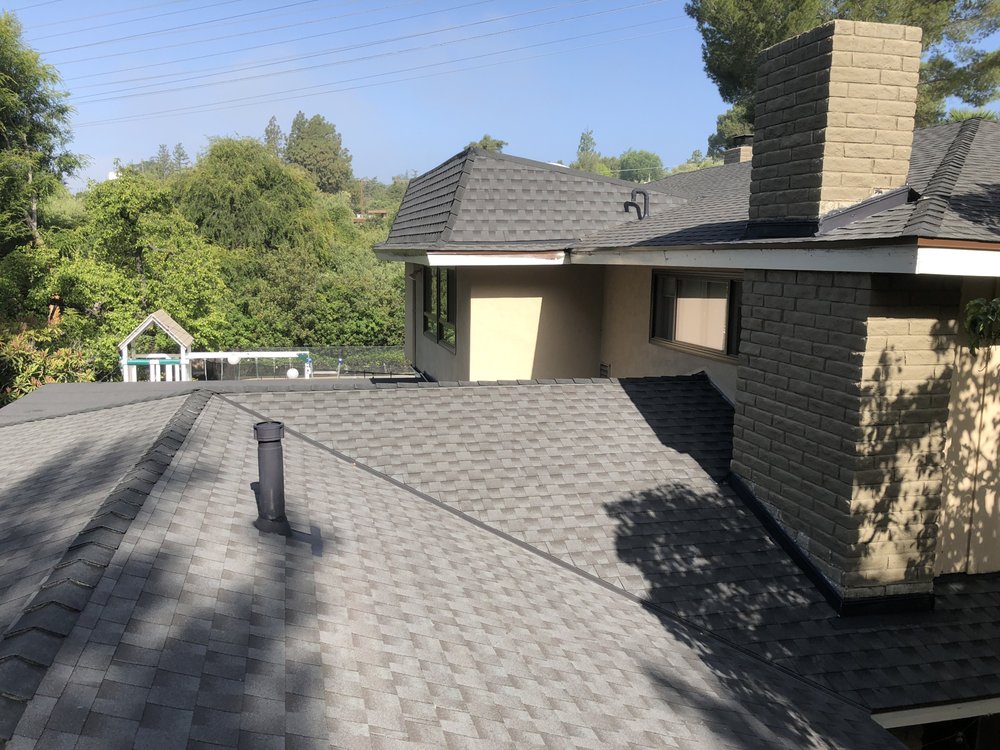 Slide of JW Roofing Services