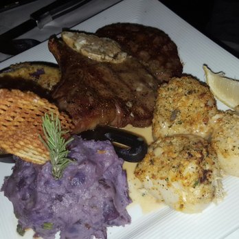 Francesca's Cucina - Aged ribeye with mashed sweet potato, corn souffle and crab stuffed scallops. - Italian Near Me - Syracuse, New York