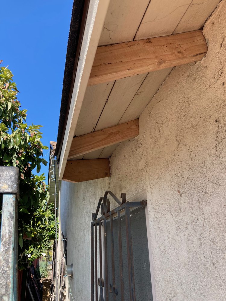 Slide of Al's roofing repairs