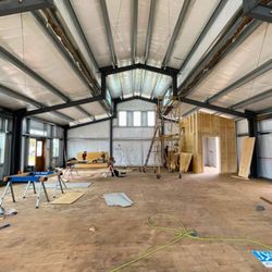 Crusader Home Improvements - Finished out the inside of this event center with white washed shiplap and wainscot