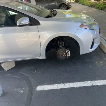 Rocklin Ranch Apartments - Front right side of vehicle after tires were stolen - Apartments Near Me - Rocklin, California Rocklin Ranch Apartments - Front right side of vehicle after tires were stolen - Apartments Near Me - Rocklin, California