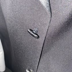 Waldorf Tuxedo Company - Loose button on tuxedo jacket