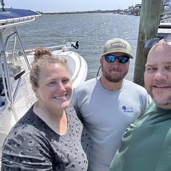 Edisto Watersports & Tackle - Captain Cal in the center.