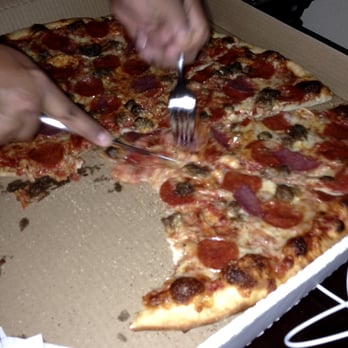 Hoboken Pie - Here we are, cutting our own pizza, because Hoboken Pie didn't bother to cut it for us. - Pizza Near Me - Austin, Texas Hoboken Pie - Here we are, cutting our own pizza, because Hoboken Pie didn't bother to cut it for us. - Pizza Near Me - Austin, Texas