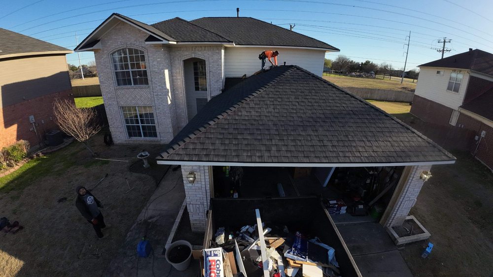 Slide of All Slopes Roofing