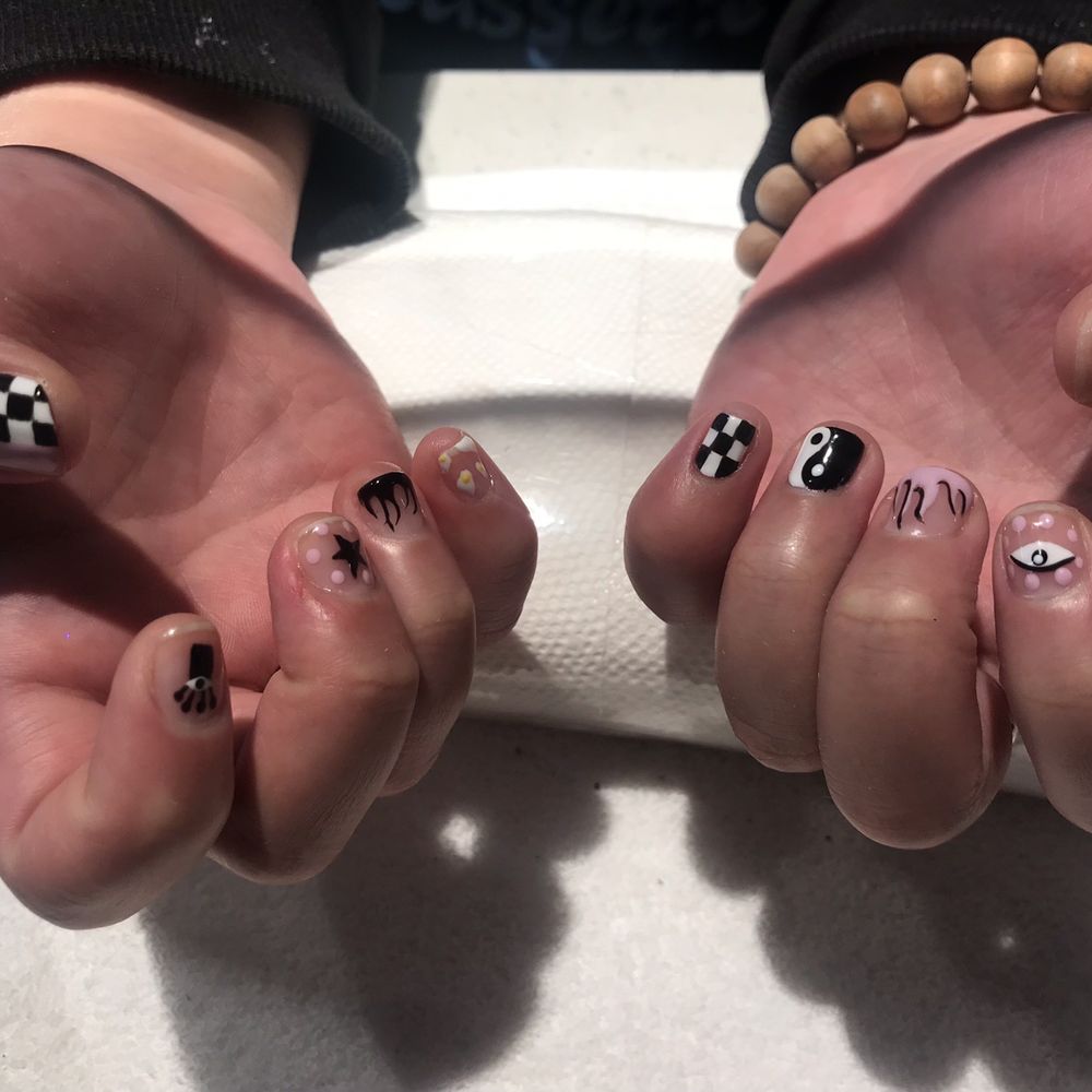 My completed nails with thumb designs. My completed nails with thumb designs.