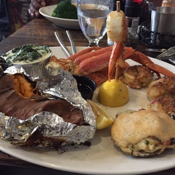 Captain James Landing - Steamed seafood platter with spinach which was delicious and baked sweet potatoe - Seafood Near Me - Baltimore, Maryland Captain James Landing - Steamed seafood platter with spinach which was delicious and baked sweet potatoe - Seafood Near Me - Baltimore, Maryland