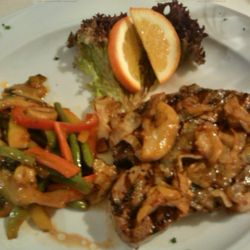 Achillion - Argentinisches Rumpsteak, Röstzwiebeln, gebratenes Gemüse.