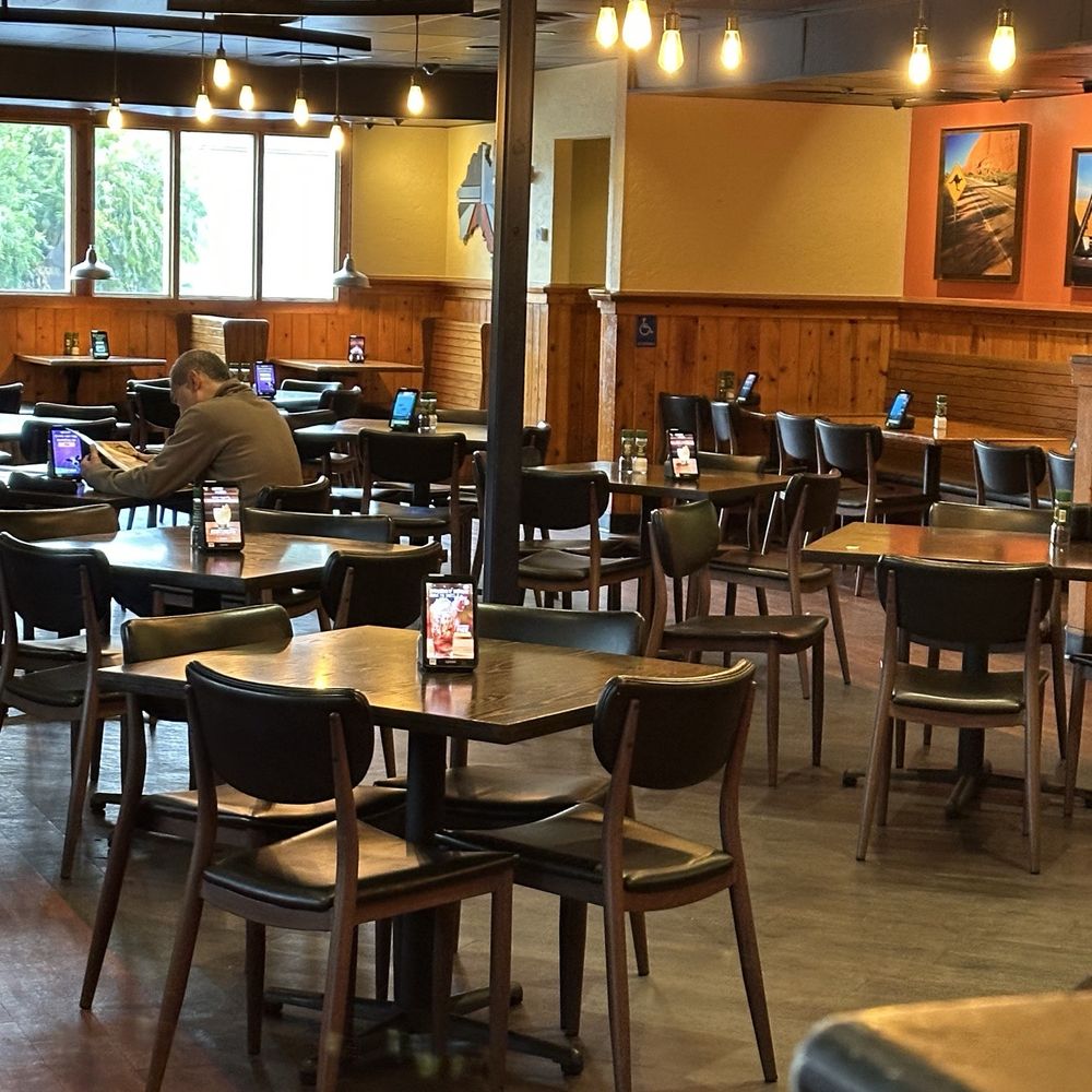 Outback Steakhouse - Inside Dinning room, tables spaced so the room does not feel crowded - Steakhouses Near Me - Daly City, California Outback Steakhouse - Inside Dinning room, tables spaced so the room does not feel crowded - Steakhouses Near Me - Daly City, California