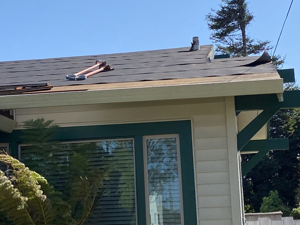 Slide of Urrutia Roofing