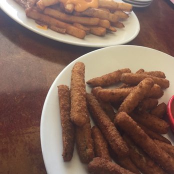 Goochie Brothers - Zucchini sticks and cheese fries. Nice size portion for the price. - Italian Near Me - Brigantine, New Jersey Goochie Brothers - Zucchini sticks and cheese fries. Nice size portion for the price. - Italian Near Me - Brigantine, New Jersey
