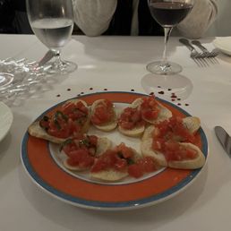 Their Bruschetta. Thin bread (to keep the carbs low) and wonderful tomatoes and basil. So tasty. Their Bruschetta. Thin bread (to keep the carbs low) and wonderful tomatoes and basil. So tasty.
