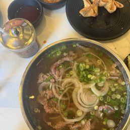 Ribeye pho and crab wontons ( half eaten )