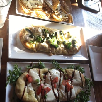 Waterfront Warehouse - Greek fries, Caprese flat bread, and Chicken Alfredo flat bread - Gastropubs Near Me - Kenosha, Wisconsin Waterfront Warehouse - Greek fries, Caprese flat bread, and Chicken Alfredo flat bread - Gastropubs Near Me - Kenosha, Wisconsin