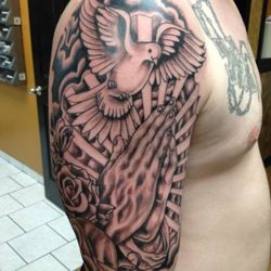 Sacred Art Tattoo