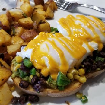 Stray Hen Cafe - Avocado Toast - smashed avocado, black beans, grilled corn, jalapeno and poached eggs w/sriracha aioli. - Breakfast & Brunch Near Me - Elmhurst, Illinois Stray Hen Cafe - Avocado Toast - smashed avocado, black beans, grilled corn, jalapeno and poached eggs w/sriracha aioli. - Breakfast & Brunch Near Me - Elmhurst, Illinois