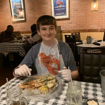 The Boil Shack - My brother eating his crab leg boil pot! He loves to get no spice and butter garlic. - Seafood Near Me - Albany, New York The Boil Shack - My brother eating his crab leg boil pot! He loves to get no spice and butter garlic. - Seafood Near Me - Albany, New York