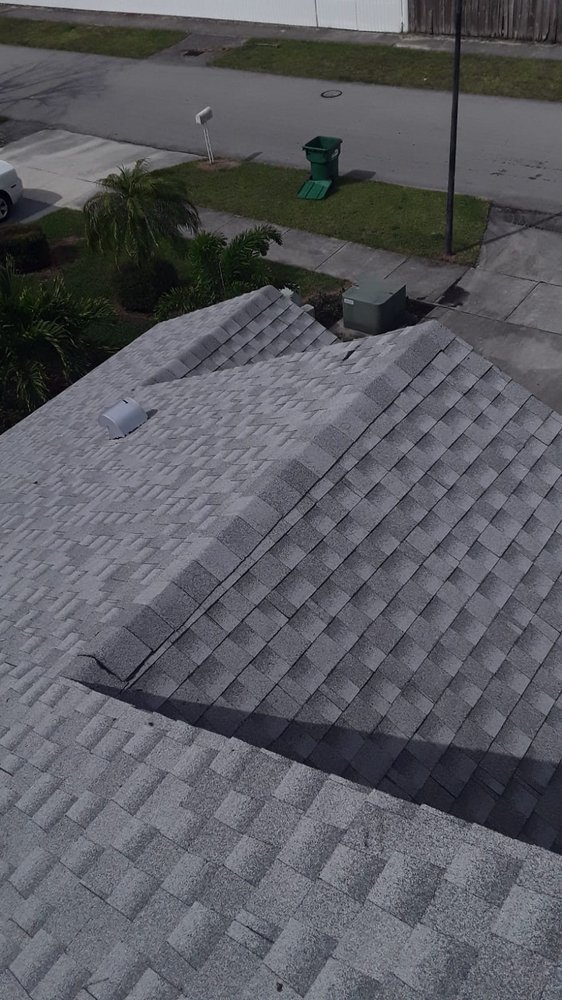 Slide of The Roof Xperts