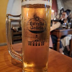 Casa do Fauno - Cerveja Estrella caneca