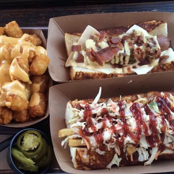 Dog Haus - Pasadena - The pig Lebowski and Scott Baioli dogs with cheese tater tots. Yummy! - New American Near Me - Pasadena, California