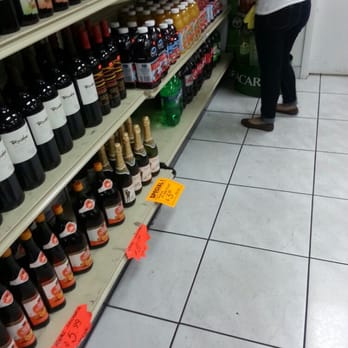 Varadero Liquor Store - a woman shopping in a store - Beer, Wine & Spirits Near Me - Miami, Florida Varadero Liquor Store - a woman shopping in a store - Beer, Wine & Spirits Near Me - Miami, Florida