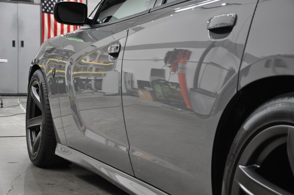 Photo of Immaculate Reflections Auto Detailing - Brentwood, CA, US. Full paint correction and CQuartz Finest Reserve ceramic coating on paint/wheels/calipers of this new Charger Hellcat